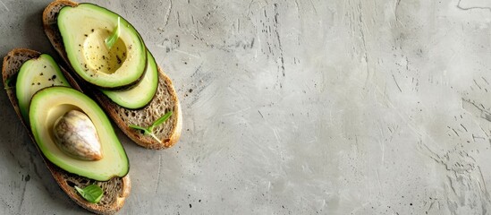 Wall Mural - Slices of bread and avocado in a kitchen at home, with room for text.