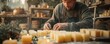 © Настя Шевчук - An artisan crafting handmade candles in a cozy workshop, pouring fragrant wax into molds and adding decorative touches.