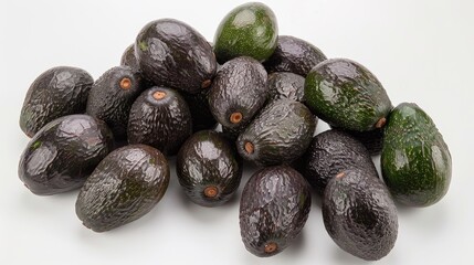 Wall Mural - Hass avocados gathered against a white backdrop