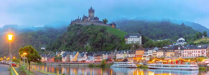 Wall Mural - Panorama of Foggy Cochem, beautiful town on Moselle river, Reichsburg castle on hill, Germany