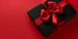 © Diffin - Black gift box with red ribbon on a red background. Elegant and festive design suitable for holiday gift presentations.