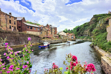 Wall Mural - Old fishing village along Staithes Beck with flowers, North Yorkshire, England