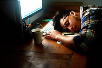 Poster - Tired man, night and sleeping with computer on desk in stress, burnout or fatigue at office. Male person or employee asleep, rest or bored in depression or overworked on project deadline at workplace