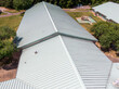 © Mathew - Daytime Drone Images of a Commercial Standing Seam Metal Roof on an Elementary School.