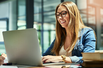 Student, girl and laptop at college for online education, research and typing essay for English assignment. Young person on computer for studying literature, scholarship and language in university
