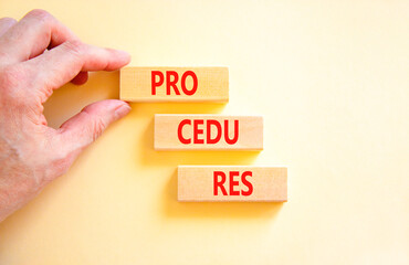 Procedures symbol. Concept word Procedures on beautiful wooden blocks. Businessman hand. Beautiful white background. Business procedures concept. Copy space.