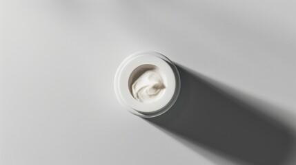 Poster - White Cream Jar With Swirling Texture and Shadow on Grey Background