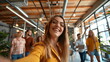 © dobok - Young Woman Selfie Friends Gathering Casual Office Space