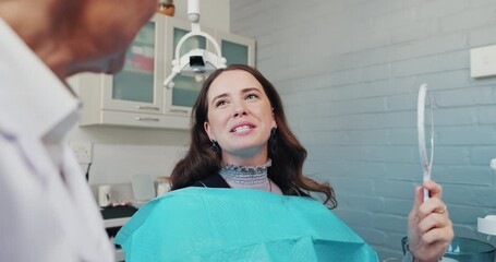 Wall Mural - Women, dentist and happy patient with mirror for dental surgery in clinic for teeth whitening and treatment. Portrait, doctor and smile or confident on consultation for canal procedure and oral care