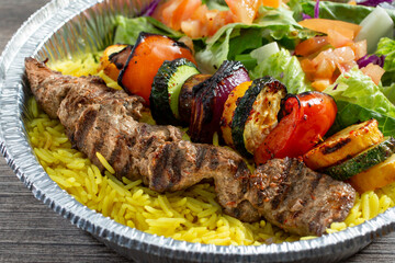 Wall Mural - A closeup view of a steak kebab entree.