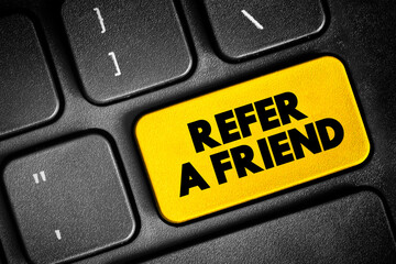 Refer a Friend text button on keyboard, concept background