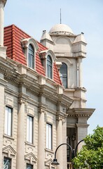 Wall Mural - Historic European-style building with red-tiled roofs and ornate details in Wuhan, China