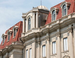 Wall Mural - Historic European-style building with red-tiled roofs and ornate details in Wuhan, China