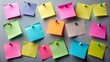 © Wanlop - Vibrant assorted sticky notes and labels scattered on gray background with pin and notepaper meeting reminder in modern flat design.