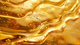 Abstract golden liquid waves and oil texture close-up