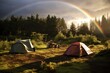 © OhmArt - Campsite with a rainbow after rain.