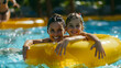 © Daniel - mother and daughter in a yellow pool float on a lazy river at an waterpark, close up