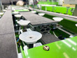 © ekkaluck - Air vacuum pads and conveyor belt on production line.(Soft focus)