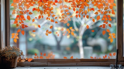 Sticker - Autumn leaves arranged on a sunlit window, creating a warm and inviting seasonal display.