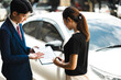 © NINENII - Insurance concept, insurance agent checking broken car and submit a claim form after an accident traffic accident