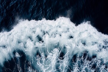 Wall Mural - Troubled ocean with rough waves. Top view. Foamy wave. Copy space