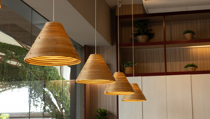 Sticker - Four lamps hanging from the ceiling, each with a different shade