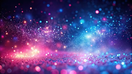 Abstract glowing particles in pink, blue, and purple colors creating a magical sparkling dust effect on a defocused background