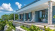 © Ramzan - Cliffside dwelling with robust Bahama shutters, offering durability against harsh weather conditions