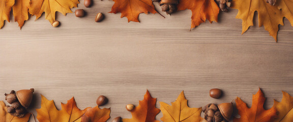 Wall Mural - Fall themed flat lay composition with a border of dried oak leaves and acorns on an autumn backgroun