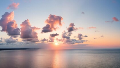 Wall Mural - Pastel Dreamscape Serene Sunrise with Cotton Candy Clouds