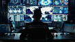 © ArtistryAxis - Professional office specialist works on desktop in high-tech monitoring control room Manager types uses mouse amid digital screens Futuristic ambiance clean lighting
