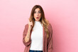 © luismolinero - Caucasian woman isolated on pink background intending to realizes the solution while lifting a finger up