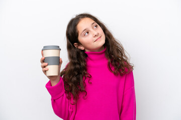 Wall Mural - Little caucasian girl holding a take away coffee isolated on white background looking up while smiling