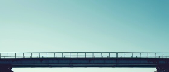 Sticker - A bridge with a railing and a blue sky in the background