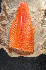 Wall Mural - raw salmon fillet red fish seafood meal food snack on the table copy space food background