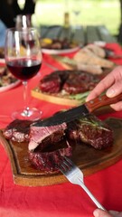 Wall Mural - people eat meat in a restaurant. Close-up