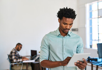 Fototapete - Tablet, typing and man in office, research and online to read brief of web design, project and coworking. Entrepreneur, planning and person in workspace, coding and creative for digital agency