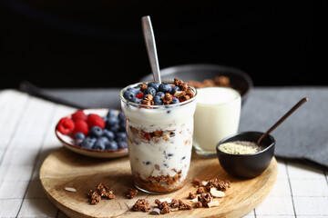 Wall Mural - Overnight oat with berries and white yogurt in a glass