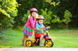 © famveldman - Two children riding bikes