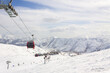 © яна винникова - Gudauri Ski Resort: Gondola (Ski Lift) and Snow-covered Caucasus Mountains in Distance - Gudauri, Georgia