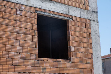 brick wall with windows