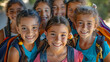 © john - A group of young girls wearing backpacks and smiling for the camera.