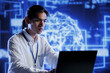 © DC Studio - Licensed programmer in data center uses artificial intelligence computing simulating human brain through self learning algorithms. Adept professional holds laptop, working with AI deep neural networks