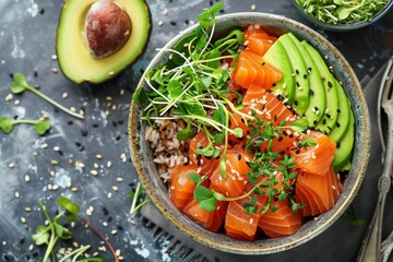 Sticker - Salmon or tuna poke bowl with avocado sesame seeds micro greens and persimmon Top view of Hawaiian fish dish