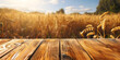 © ConceptStudio - Empty wooden table mockup on the background of a wheat field