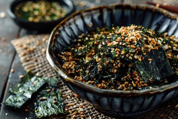 Poster - Vegan furikake with torn nori seaweed in a bowl Traditional Japanese condiment