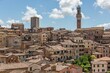 © Wirestock - A photograph of the city of Siena, Italy.