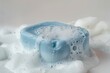 © valentina - blue soap piece in foam white color soap washing shampoo. backdrop for text presentations