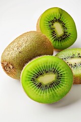 Sticker - Fresh kiwis cut in half on a clean white surface, ready for use or display