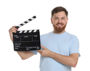 Poster - Making movie. Smiling man with clapperboard on white background